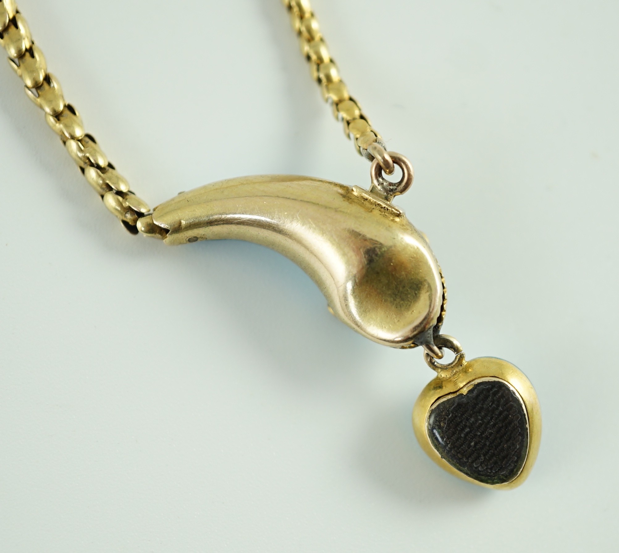 A late Victorian gold, enamel and split pearl set serpent drop mourning necklace